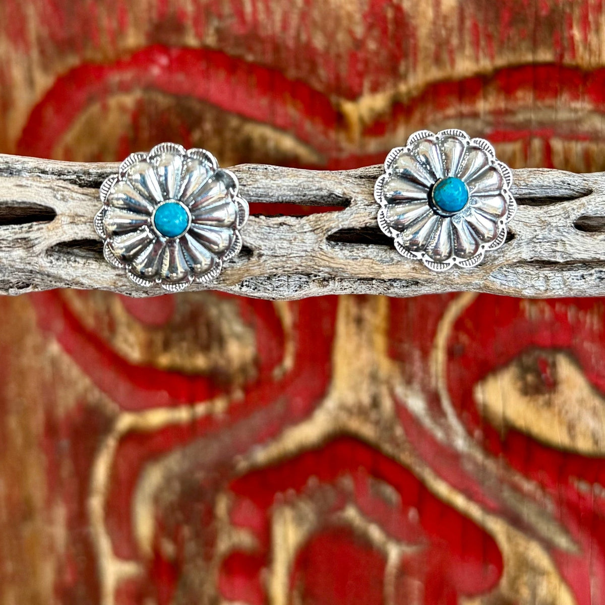 Boho Sol flower post earrings in silver and turquoise, featuring a detailed concho-style floral design, with a turquoise stone centerpiece for added color and contrast - T1370. Available at Blair's Western Wear, Marble Falls, TX.