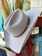 Buckskin-colored 6X felt Western hat with a tan hatband, structured crown, and brim — Blair's Western Wear Marble Falls TX