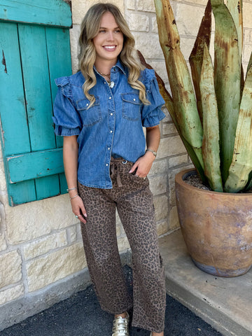 Women's brown leopard barrel crop jean styled with ruffle denim shirt and gold sneakers, full outfit front view — Blair's Western Wear Marble Falls TX