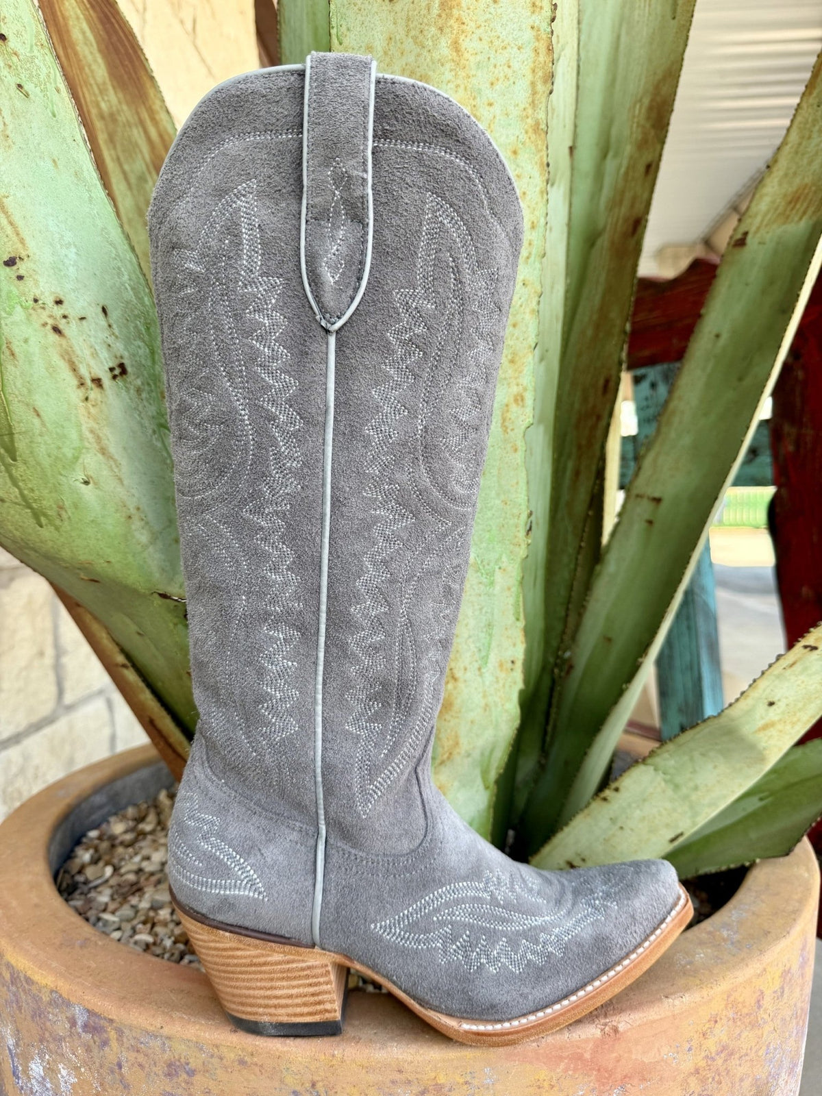 Front view of women's ash gray suede Ariat Casanova tall western boot showing cream embroidery detail and snip toe — Blair's Western Wear Marble Falls TX