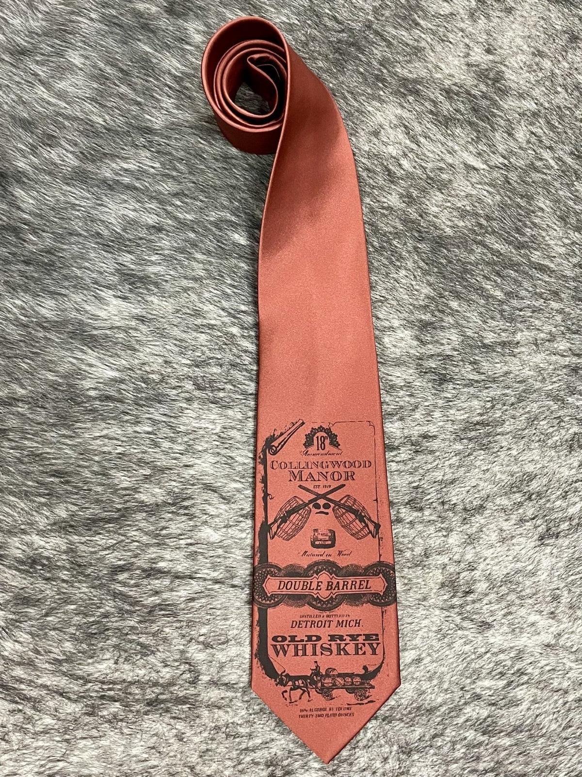 Men's cinnamon terracotta satin necktie with tonal vintage whiskey label novelty print, smooth finish, standard width pointed tip — Blair's Western Wear Marble Falls TX