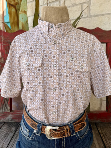 A short-sleeve western-style button-up shirt with a beige, brown, and white geometric pattern, displayed on a mannequin torso styled with blue jeans and a brown leather belt.