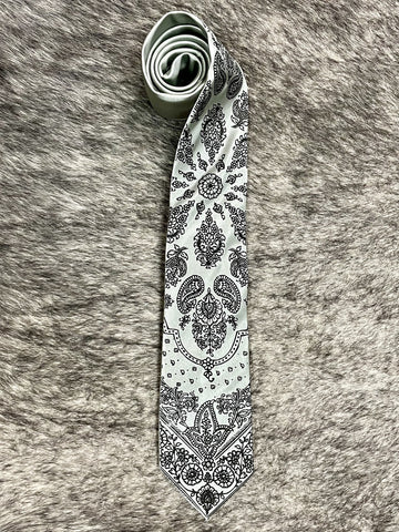 Men's light gray necktie with black bandana-inspired paisley and floral print, smooth woven finish, standard width pointed tip — Blair's Western Wear Marble Falls TX