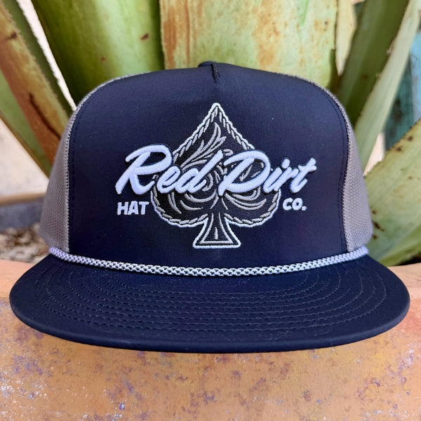 Men's black mesh trucker cap with embroidered Red Dirt Hat Co. logo and ace of spades graphic — Blair's Western Wear Marble Falls TX