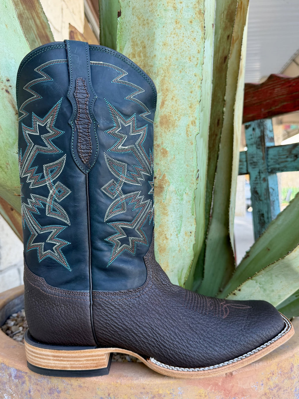 Side view of dark chocolate shark square-toe boot with dark stitched shaft, side pull tab and contrasting welt stitching — Blair's Western Wear Marble Falls TX