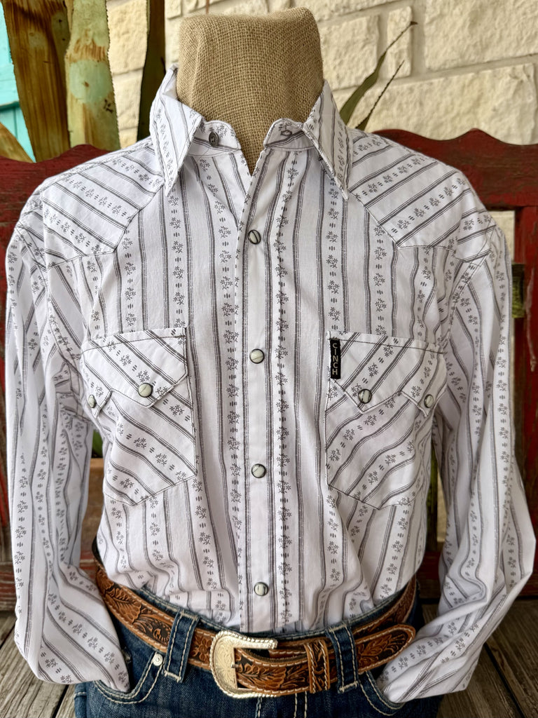 Full front view on mannequin: white long sleeve western shirt with gray vertical stripe and floral/botanical print, snap front closure, dual chest pockets with snap closures, point collar.