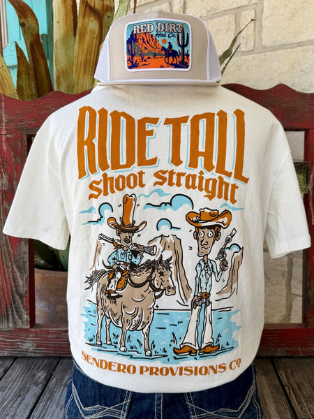 Men's white Sendero Provisions Co. Ride Tall Shoot Straight short sleeve tee with bold orange turquoise brown cartoon cowboy desert scene back graphic RIDE TALL block letters and shoot straight script, back view styled with jeans and tooled leather belt — Blair's Western Wear Marble Falls TX