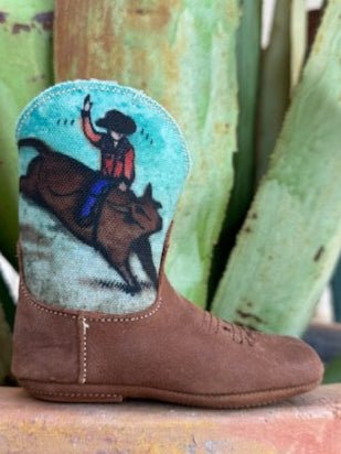 Infant Brown and Blue Boot with a graphic of a cowboy riding a bull - 91679071377 - These little boots have a zipper on the side and rubber bottom. Available at BLAIR'S Western Wear located in Marble Falls TX