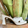 • Women's Chinese Laundry Platform Heel in off-white, featuring a soft knotted upper with a square toe design – BGFP01P9E. Available at Blair's Western Wear, Marble Falls, TX.