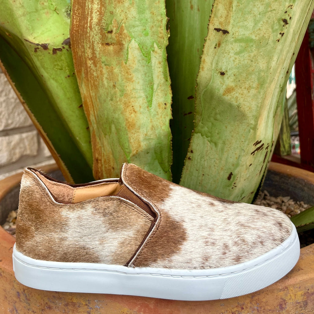 Women’s Agave Sky Cowhide Slip-On Sneakers in Salt & Pepper, featuring authentic cowhide upper with elastic side panels, and cushioned insole for comfort - UTAH. Available at Blair's Western Wear, Marble Falls, TX.