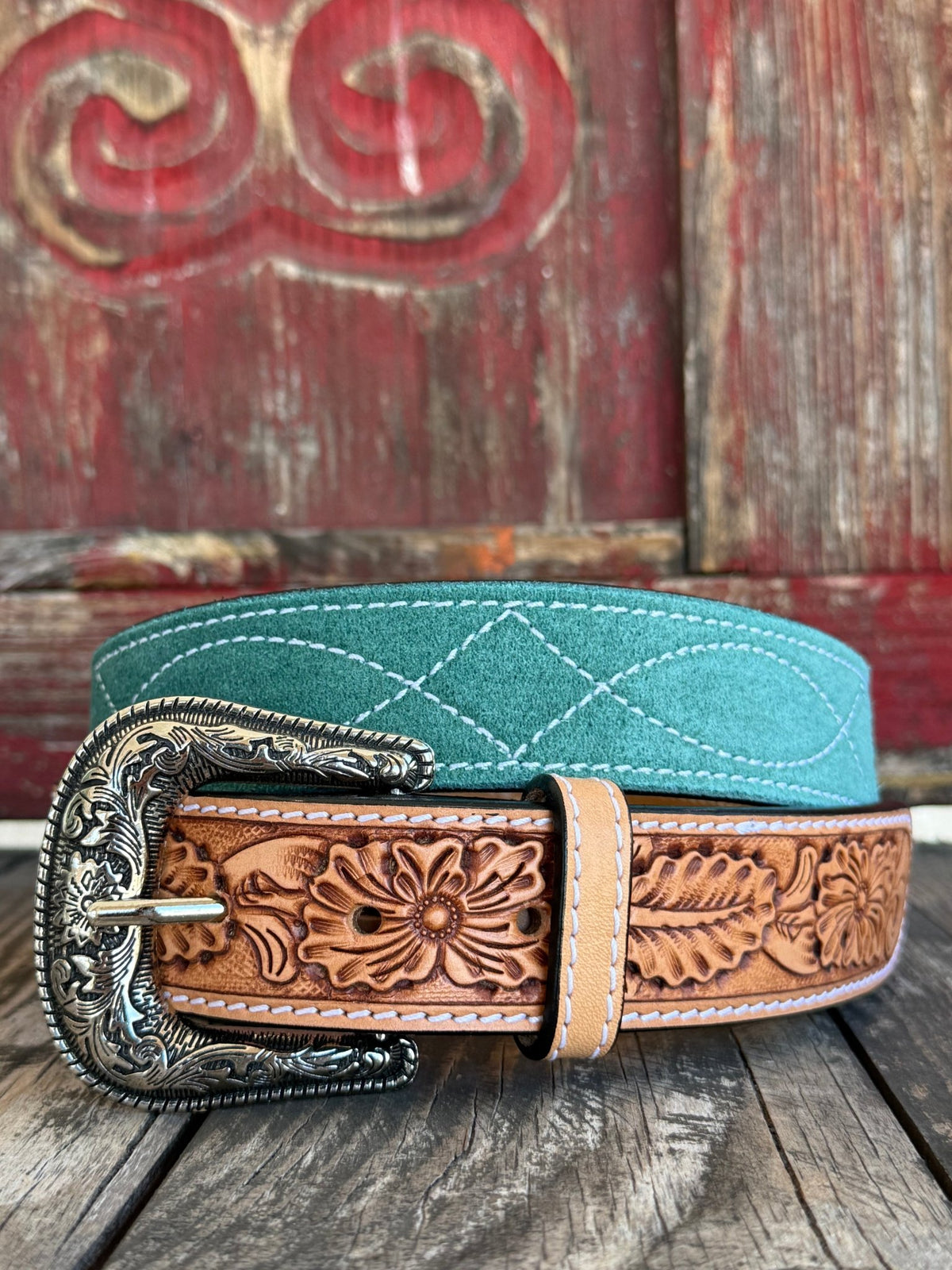 Ladies American Darling turquoise suede tooled leather belt with floral tan overlay and silver engraved buckle, built from full-grain leather that resists wear and finished with reinforced stitching – ADBLF333. Available at Blair’s Western Wear, Marble Falls, TX.