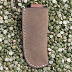 Leather Sheath in lite tan suede, crafted from durable suede leather with secure belt loop snap clip - K137. Available at Blair's Western Wear, Marble Falls, TX.