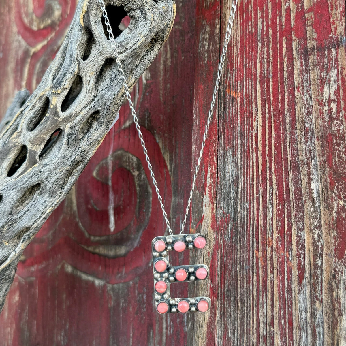 Women’s Boho Sol Necklace Letter E in Pink/Silver, handmade with pink cabochon stones, with durable sterling silver build - T320C.E. Available at Blair's Western Wear, Marble Falls, TX.