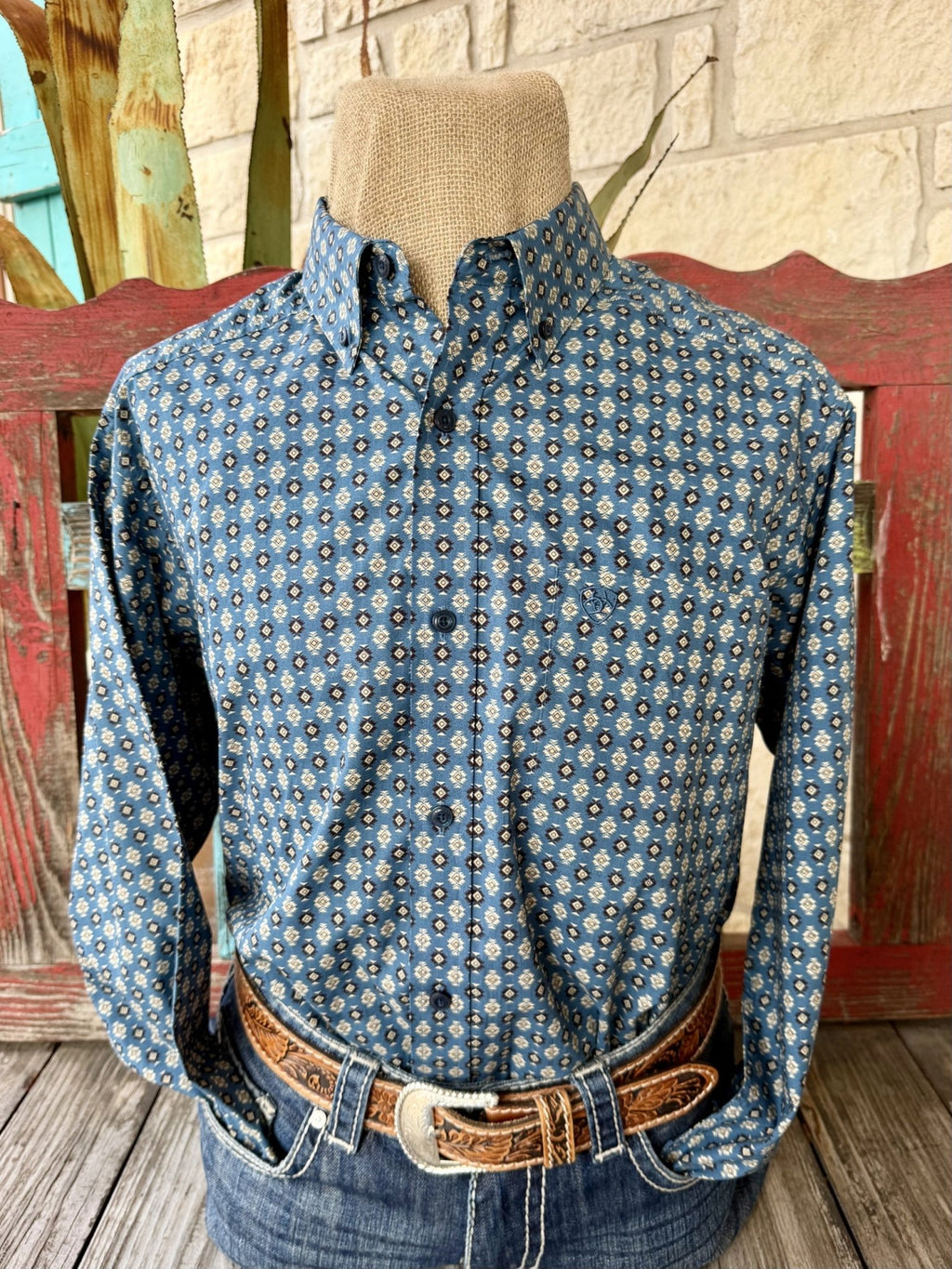 Men's blue long-sleeve button-front shirt with tan and black Aztec-inspired geometric print, button-down collar and chest pocket — Blair's Western Wear Marble Falls TX