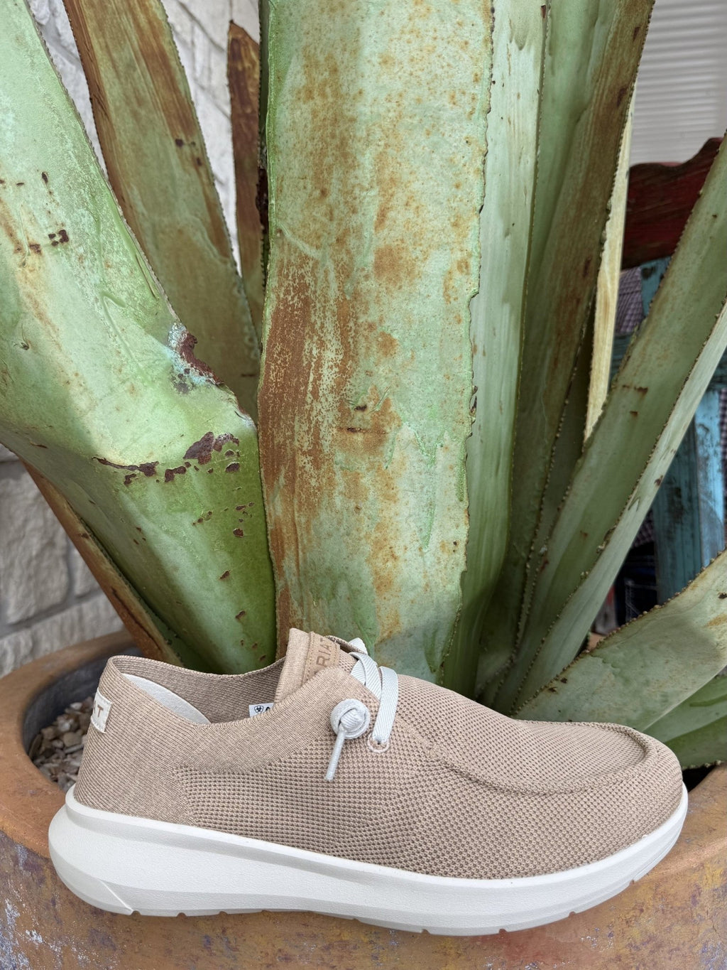 Men’s light tan knit Ariat Hilo shoe with breathable upper, adjustable laces, and cushioned support — Blair’s Western Wear Marble Falls TX