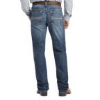  Men's medium-wash blue relaxed jeans with faded seat, horizontal back-pocket stitching and full-length legs — Blair's Western Wear Marble Falls TX