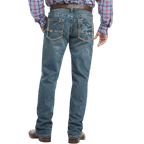 Men's relaxed fit bootcut jean in medium wash 13 oz. ring-spun cotton denim with hand-sanding and whisker details — Blair's Western Wear Marble Falls TX

