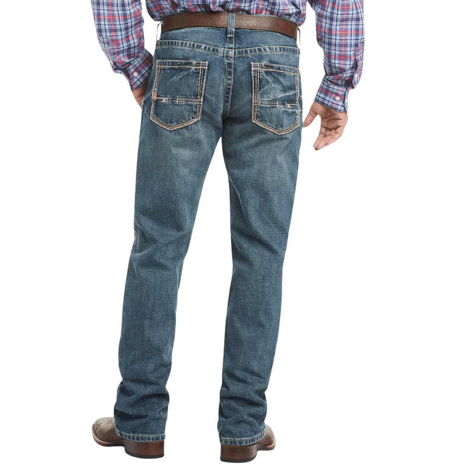 Men's relaxed fit bootcut jean in medium wash 13 oz. ring-spun cotton denim with hand-sanding and whisker details — Blair's Western Wear Marble Falls TX

