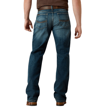 Men's relaxed fit bootcut jean in faded blue cotton denim with low rise and light back pocket stitching — Blair's Western Wear Marble Falls TX