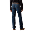 Men's dark blue relaxed bootcut jeans with warm-toned back-pocket stitching, faded seat and full-length legs — Blair's Western Wear Marble Falls TX