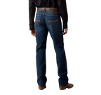 Men's dark blue relaxed bootcut jeans with warm-toned back-pocket stitching, faded seat and full-length legs — Blair's Western Wear Marble Falls TX