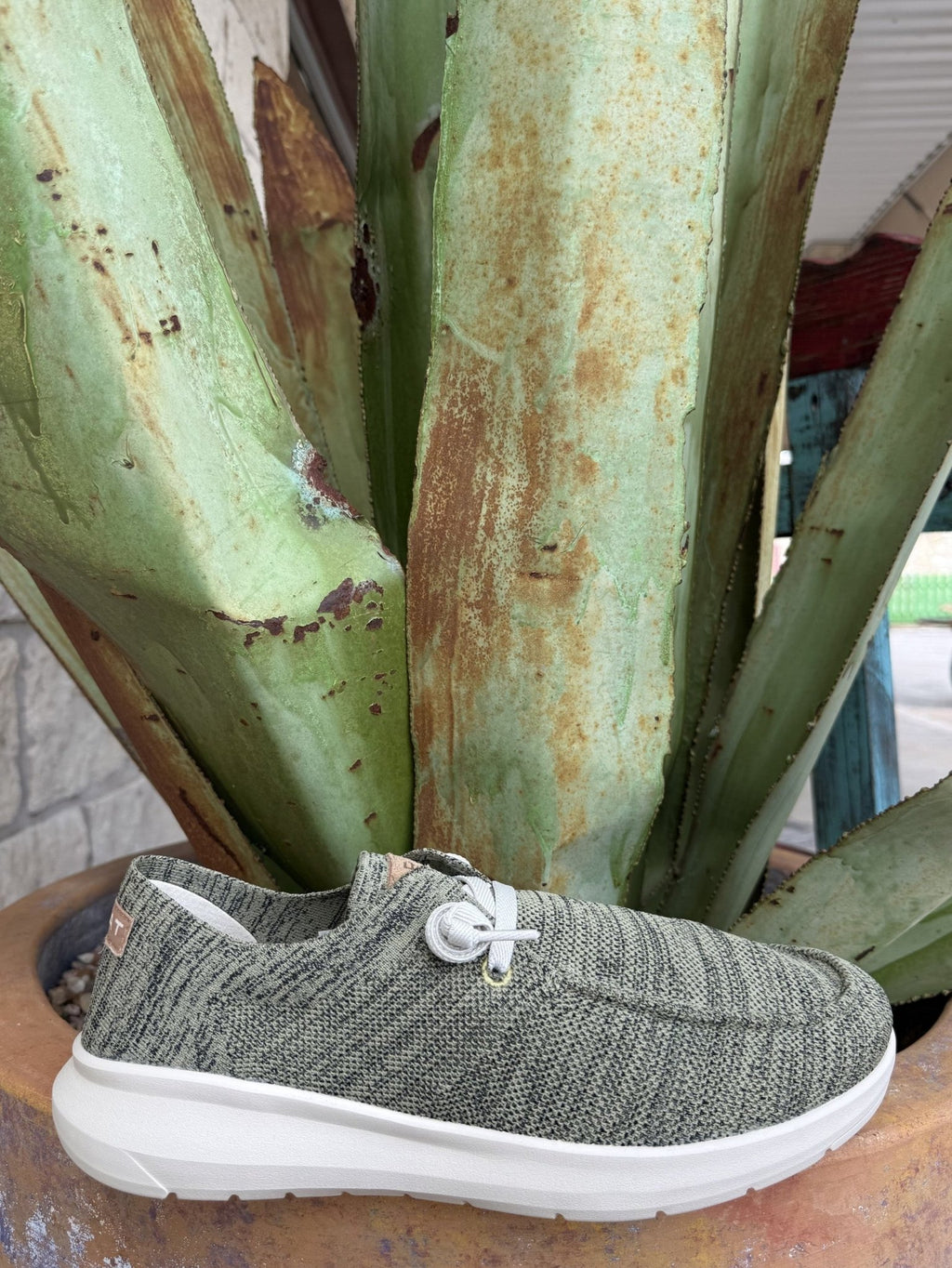 Men’s olive green knit Ariat Hilo shoe with breathable upper, adjustable stretch laces, and cushioned support — Blair’s Western Wear Marble Falls TX