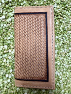 Men's tan leather checkbook wallet with basketweave tooling, dark inset border and cream perimeter stitching — Blair's Western Wear Marble Falls TX