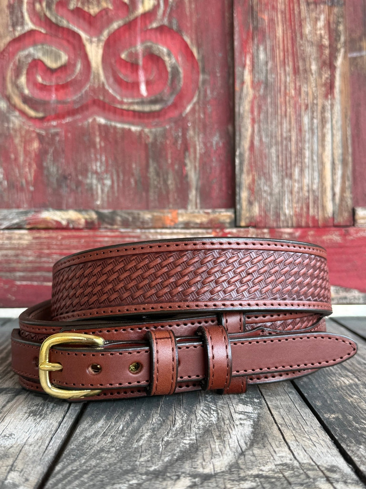 Gingerlich Ranger belt in ging brown, made from high-quality leather, showcasing a basketweave design with a robust gold-tone buckle - 826234. Available at Blair's Western Wear, Marble Falls, TX.