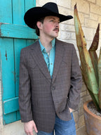 Brown plaid men's western sport coat with gold and charcoal accents, two-button front, and western-style back yoke — Blair's Western Wear Marble Falls TX
