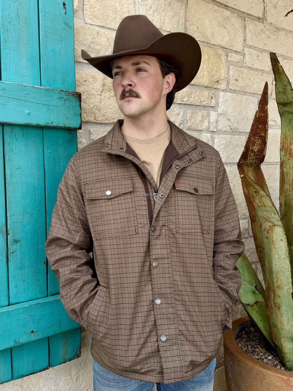 Men's brown and tan plaid jacket with pointed collar, zip-front closure beneath a snap placket, two snap-flap chest pockets, side pockets, and long sleeves — Blair's Western Wear Marble Falls TX