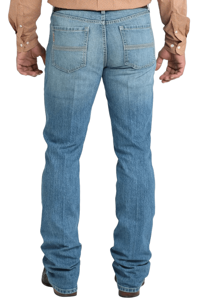 Men's slim fit stretch denim jean in medium stonewash with sanding and whisker details and boot-friendly leg opening — Blair's Western Wear Marble Falls TX