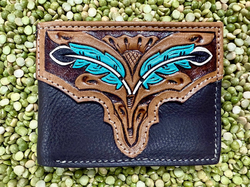 Men’s Tackrus Challenger bifold leather wallet in black and brown with hand-tooled turquoise feather design, durable genuine leather, and multiple card slots with ID window - 18FKW59. Available at Blair's Western Wear, Marble Falls, TX.