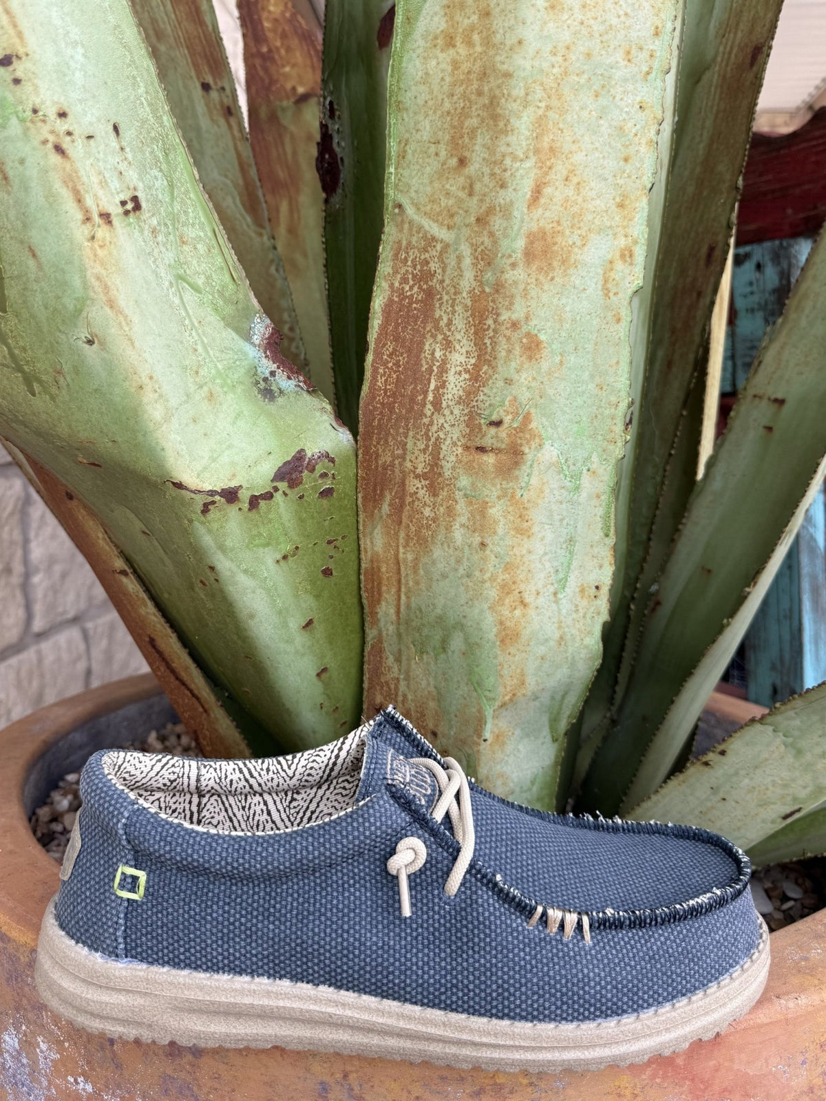 Men's breathable textile slip-on shoe in navy, denim blue, and tan with braided cotton laces, cushioned collar, and ultralight outsole — Blair's Western Wear Marble Falls TX⠋

