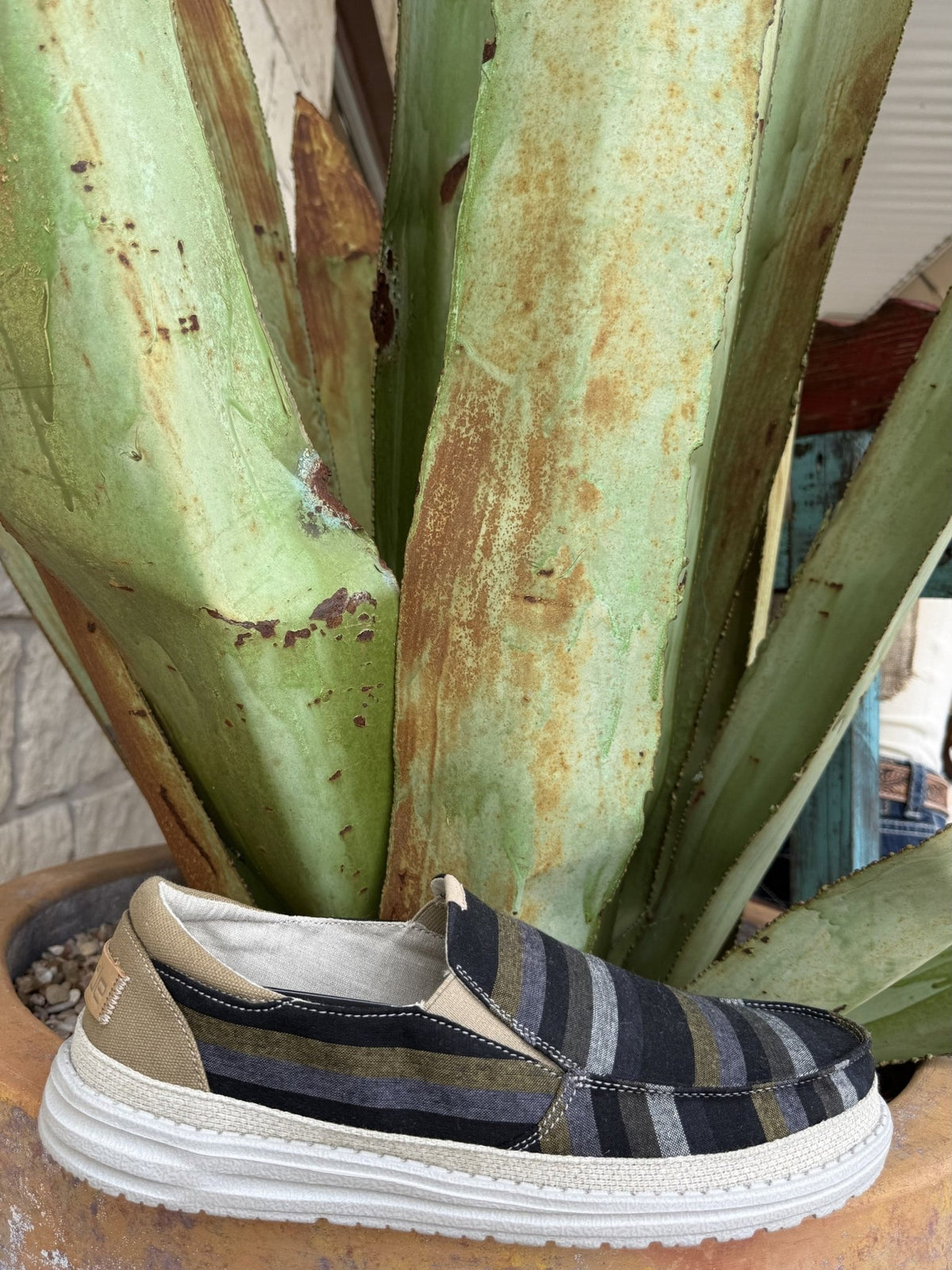 Men's stretch-knit slip-on shoe with navy, grey, and olive stripes, elastic laces, contrasting heel panel, and ultralight outsole — Blair's Western Wear Marble Falls TX⠋