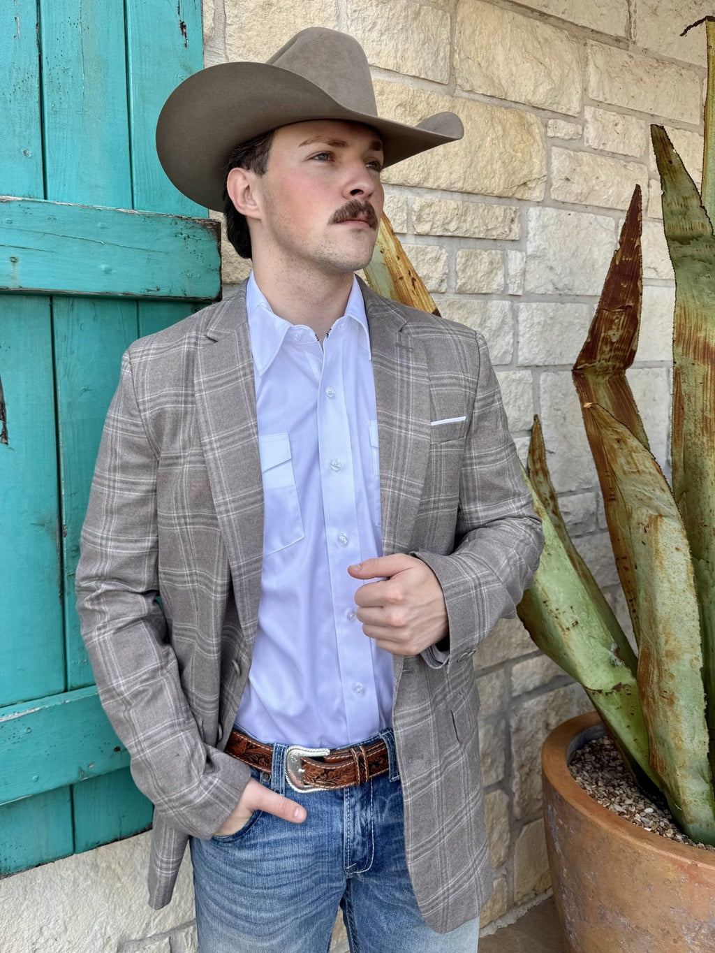 Men's light gray plaid sport coat with pale windowpane lines, notch lapels, welt chest pocket, lower flap pockets, and long sleeves — Blair's Western Wear Marble Falls TX