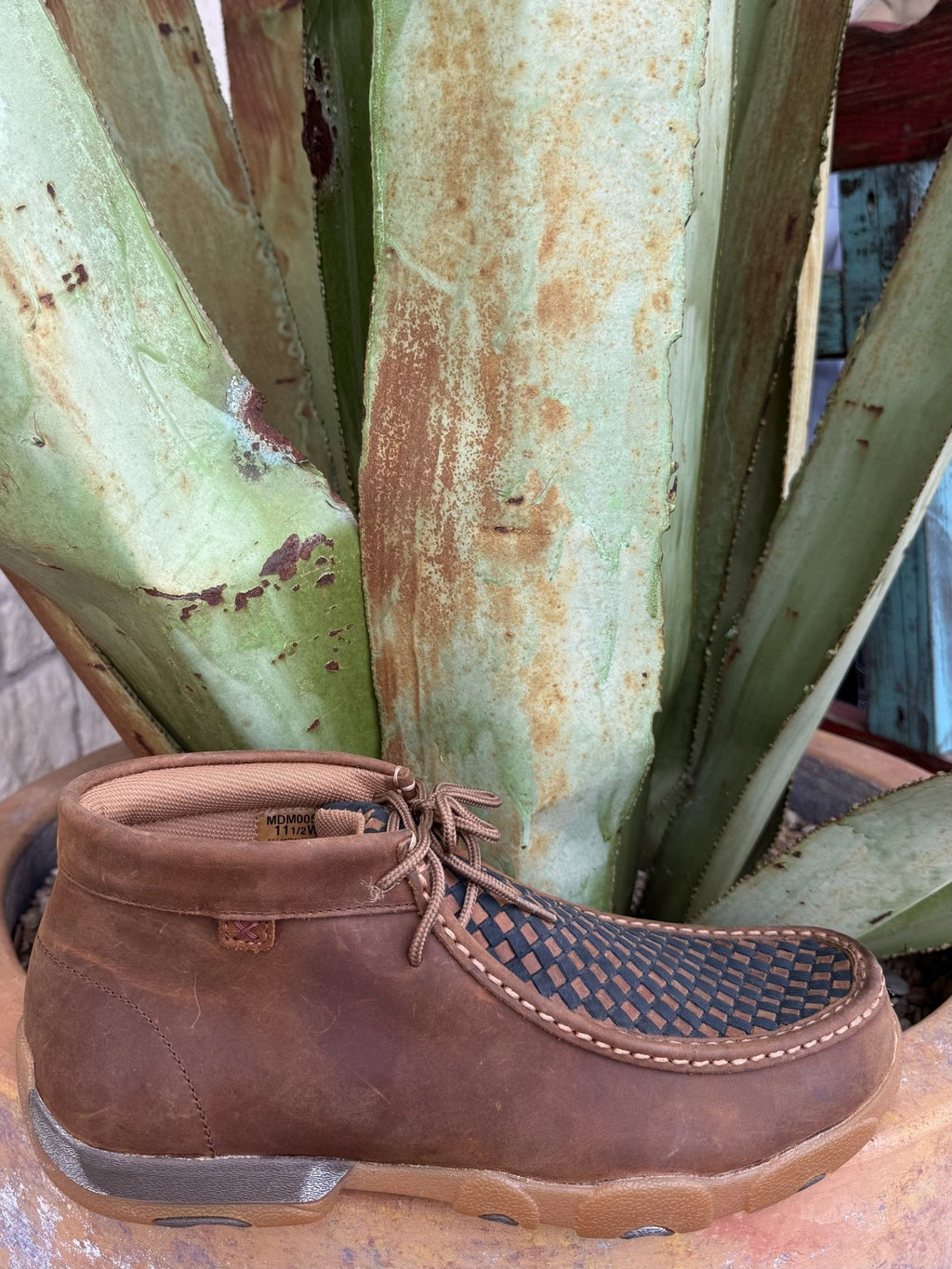Men's brown leather driving moccasin with blue patchwork upper, lace-up front, and rounded moc toe — Blair's Western Wear Marble Falls TX