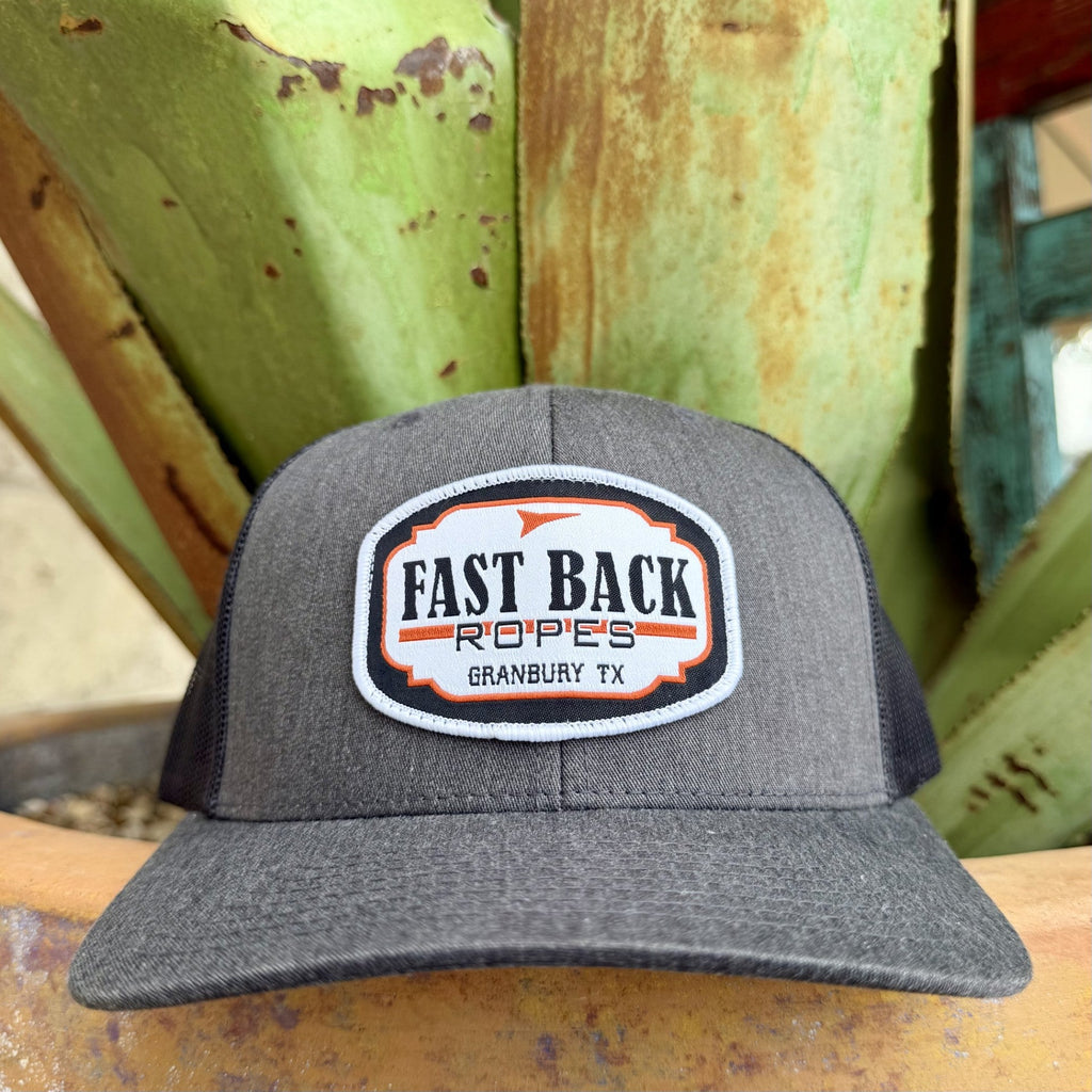 Charcoal cap with white Fast Back Ropes patch, black lettering, orange accents and tonal bill stitching — Blair's Western Wear Marble Falls TX
