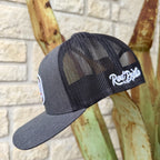Side view of charcoal cap with black mesh panels, tonal bill stitching and white embroidered rear logo — Blair's Western Wear Marble Falls TX
