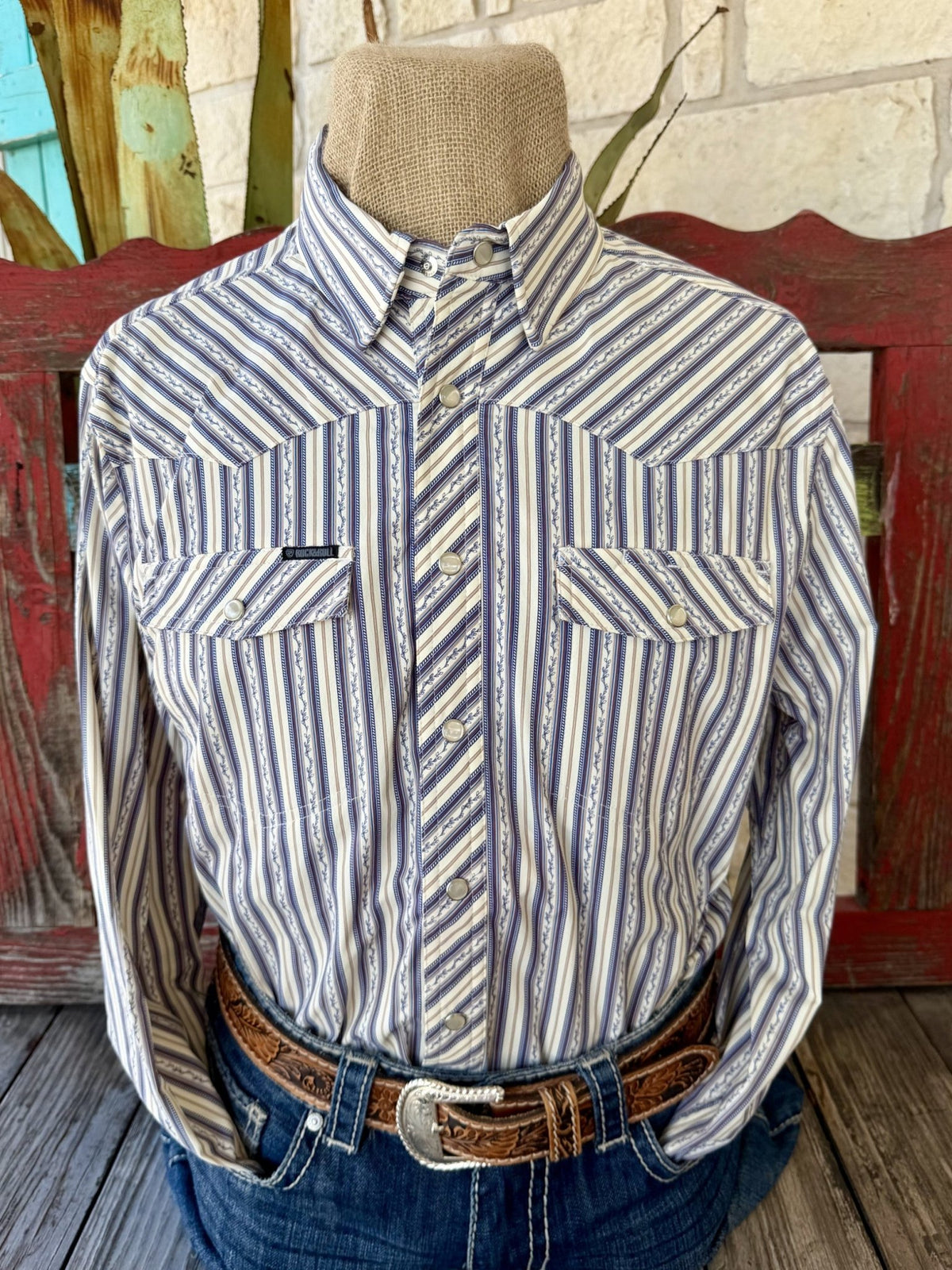 Men's natural and blue striped long-sleeve shirt with diagonal Western yokes, pearl-style snaps and two flap chest pockets — Blair's Western Wear Marble Falls TX