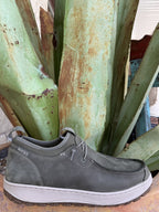 Men's spruce green full-grain leather slip-on shoe with stretch side panels, rear pull tab, rounded moc toe, and textured rubber outsole — Blair's Western Wear Marble Falls TX⠋