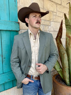 Men's sage heathered sport coat with notch lapels, pointed Western front yokes, dark front buttons, lower flap pockets, and long sleeves — Blair's Western Wear Marble Falls TX