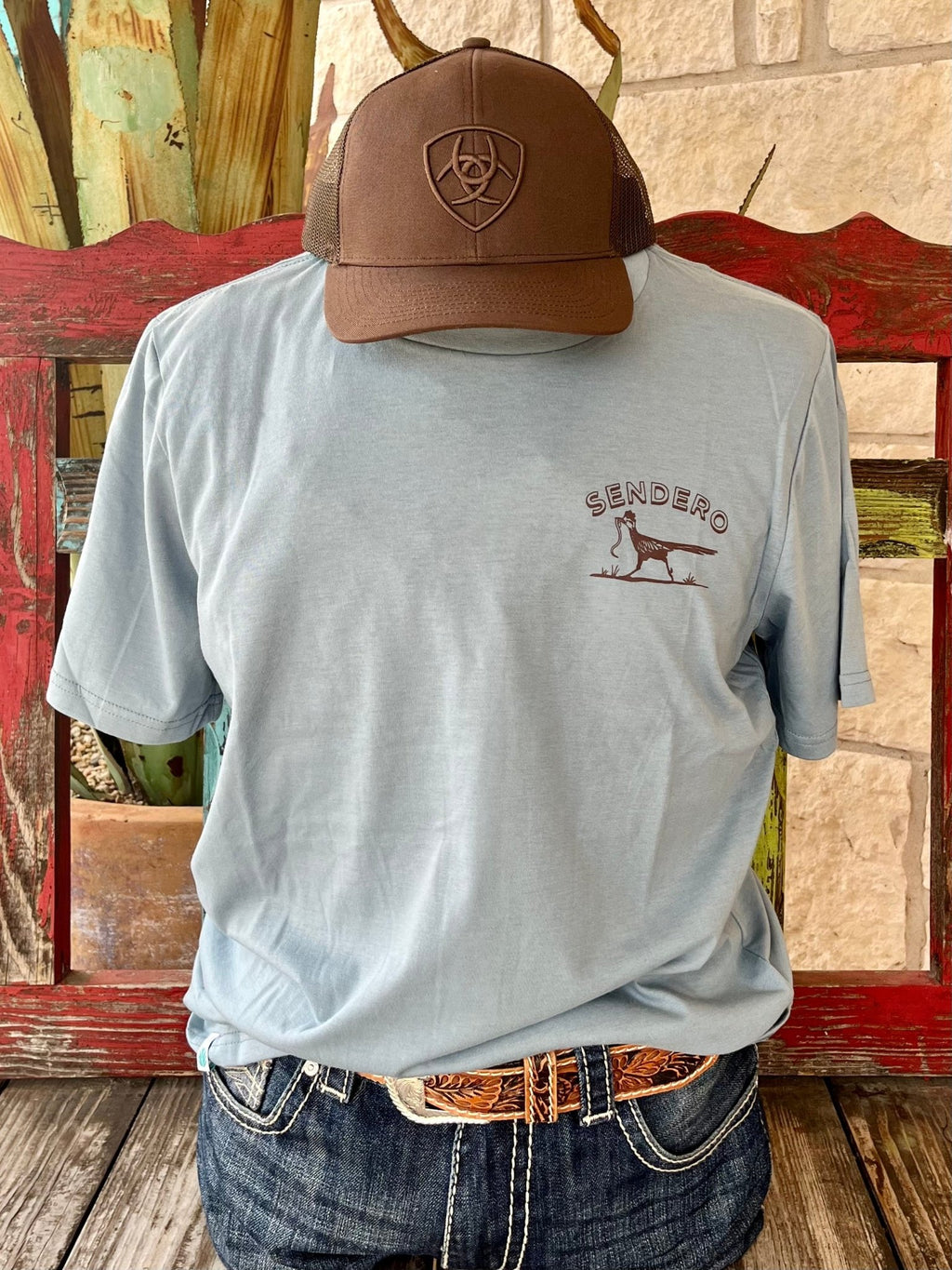 Men's Sendero Provisions Co. T-Shirt in light blue, featuring front and back roadrunner graphics and reinforced neck seam tape - Desert Runner. Available at Blair's Western Wear, Marble Falls, TX.