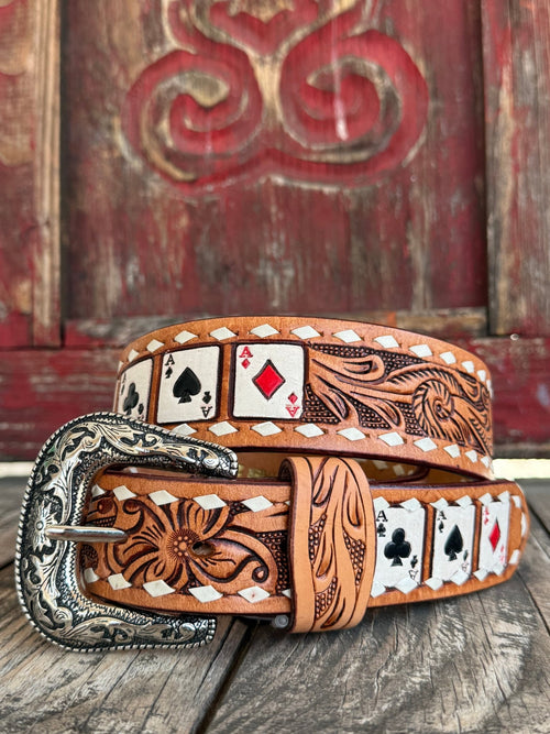 Men’s Tackrus Challenger tooled poker belt in tan leather, hand-tooled floral patterns, with poker-themed ace card bead inlay, and an engraved antique silver buckle - 26RS135T. Available at Blair's Western Wear, Marble Falls, TX.