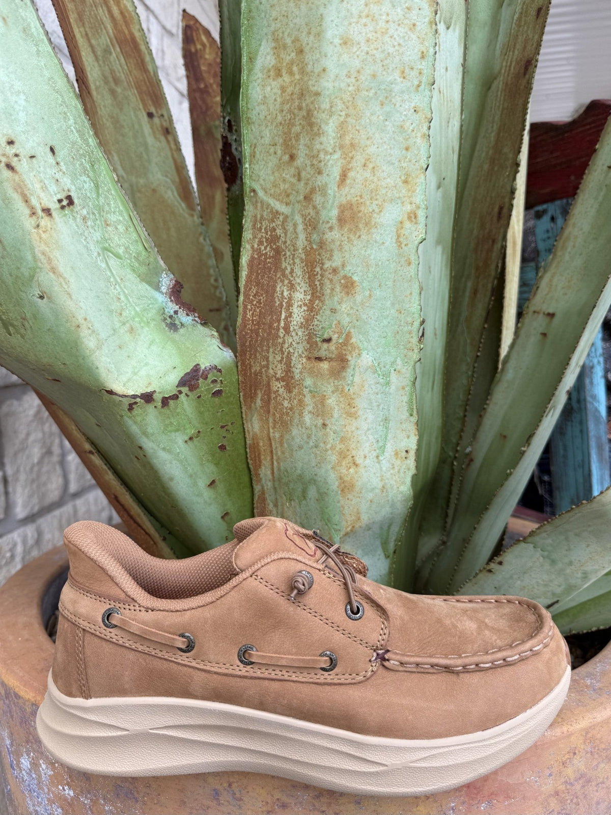 Men’s tan leather slip-on with elastic lacing, cushioned lining, and lightweight Feather X sole — Blair’s Western Wear Marble Falls TX