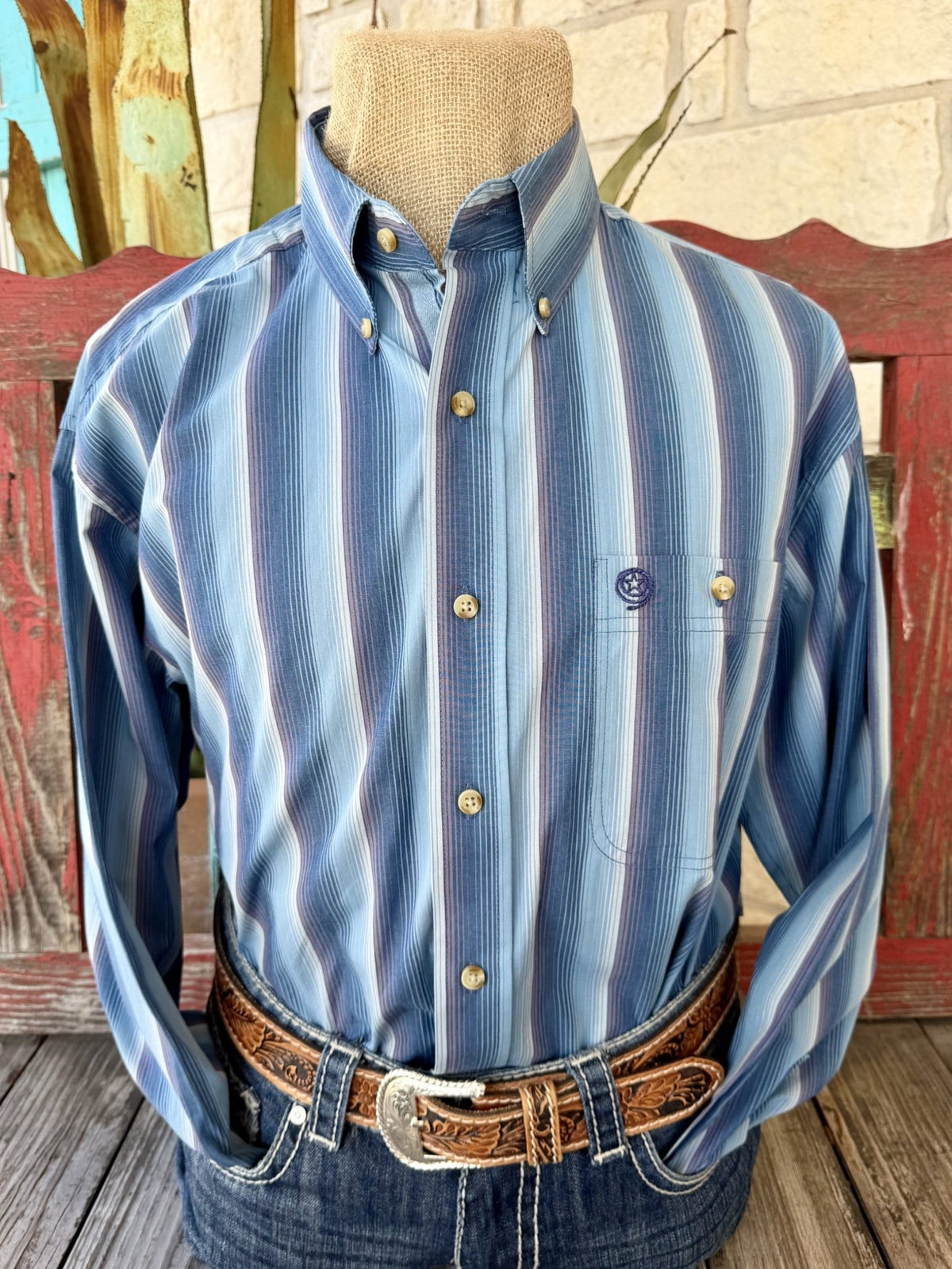 Men's blue vertical stripe long sleeve shirt with button-down collar, light-colored front buttons, and a single buttoned chest pocket — Blair's Western Wear Marble Falls TX