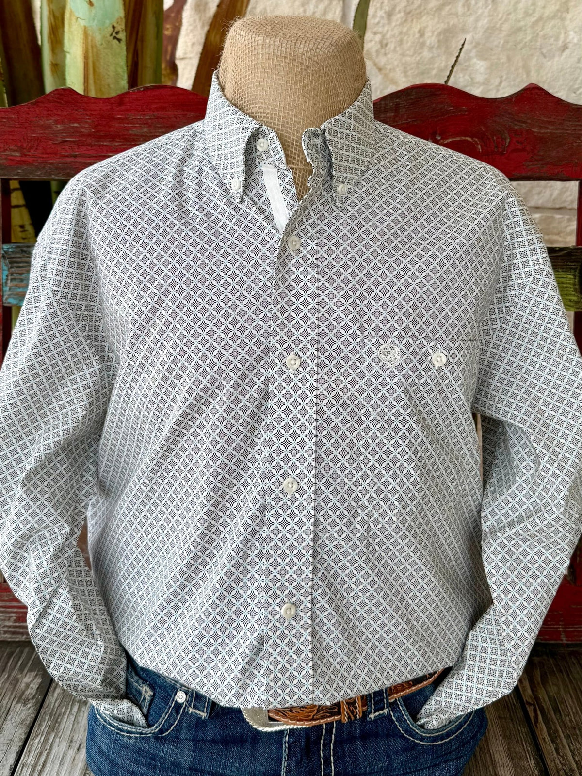Men's Wrangler George Strait Collection long sleeve button-down print shirt in white, brown, and turquoise, crafted from a breathable cotton blend, with button-down collar and embroidered front pocket - 112368201. Available at Blair's Western Wear, Marble Falls, TX.
