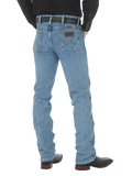 Men's slim fit Cowboy Cut blue jean with Wrangler patch, boot-cut leg opening, and light wash indigo denim — Blair's Western Wear Marble Falls TX