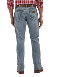Men's slim bootcut Wrangler Retro blue jean with W-stitch back pockets, rope logo leather patch, and boot-friendly leg opening — Blair's Western Wear Marble Falls TX