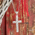 Montana Silversmiths Necklace Large Silver Cross in silver, elegantly detailed with bright cut engraving and a small flower accent - NC5890. Available at Blair's Western Wear, Marble Falls, TX.