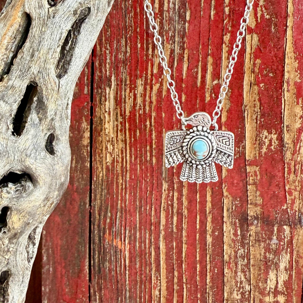 Women’s Montana Silversmiths silver thunderbird necklace with turquoise stone, handcrafted with detailed Western etching, and protected with a tarnish-resistant Montana Armor® finish – NC6315. Available at Blair’s Western Wear, Marble Falls, TX.